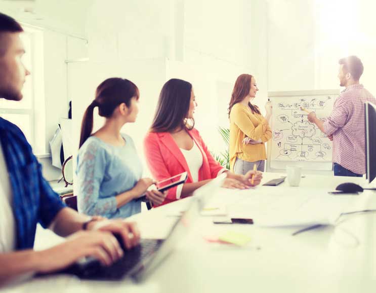 A group of professional website maintenance having a discussion on how to strengthen your presence on the online platform via Website Design & Digital Marketing Management